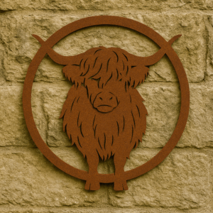 Rustic highland cow wall art silhouette made from weathering steel mounted on stone wall